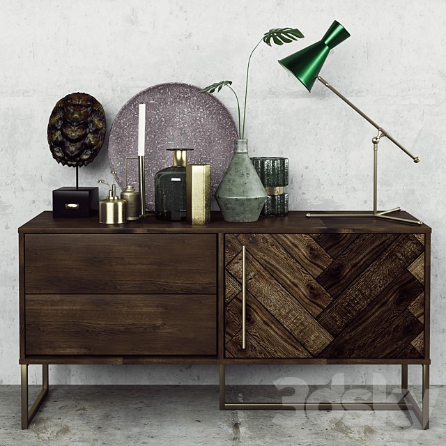 Chest of drawers with a collection decor set and a table lamp