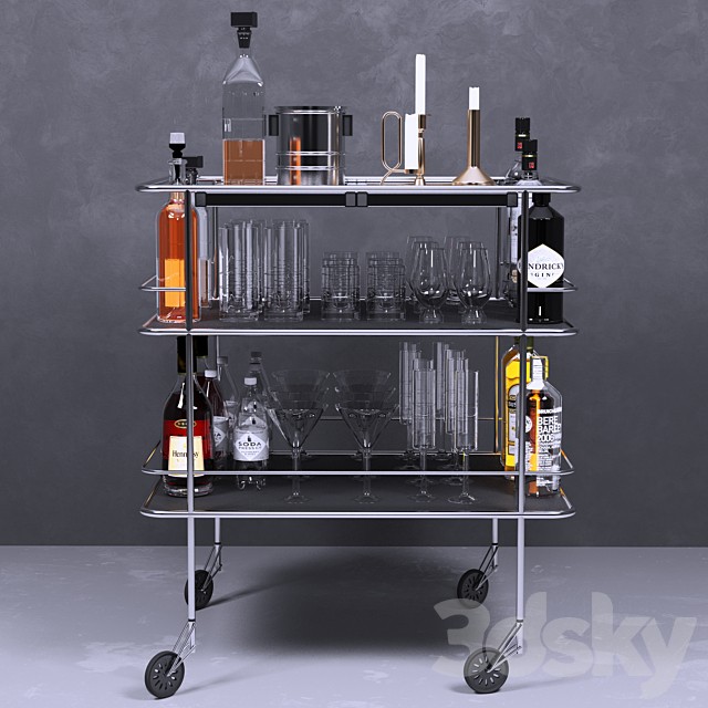 A table with alcohol and a crystal service. Wine