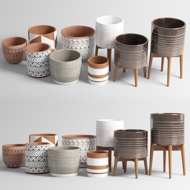 collection of earthenware and patterned concrete vases