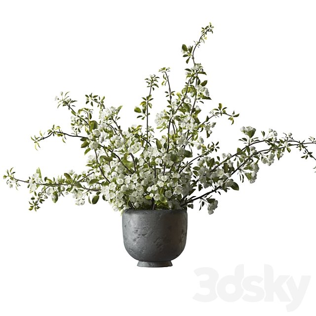 Bouquet of flowering branches in a clay vase