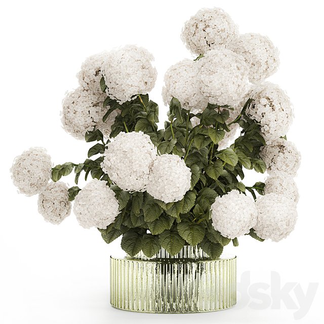 Large lush festive bouquet in a glass green vase with white hydrangea. Set 582.